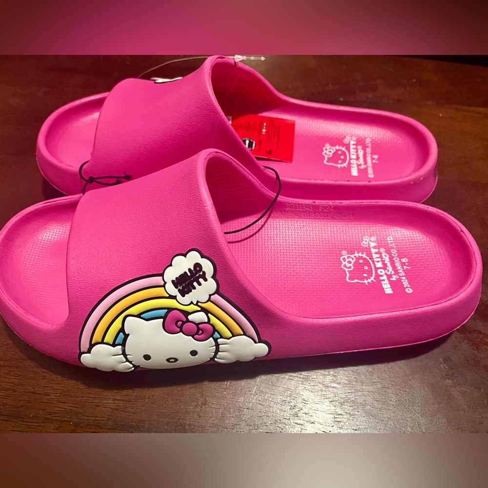 New! Adorable Hello Kitty slides. Size women’s 7-8. Super Comfy.